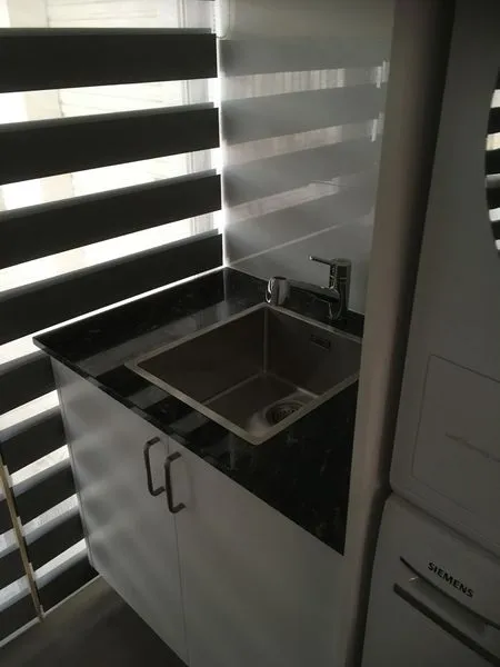 Laundry Storage Solutions: Overhead Cabinets, Pull-Outs & Sorting Systems